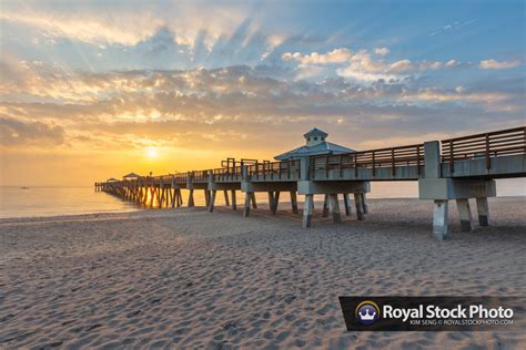 Juno Beach Pier Sunrise from Beach | Royal Stock Photo