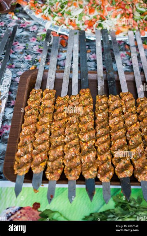 Turkish Adana Urfa Kebab Getting Ready To Be Grilled In Display Stock