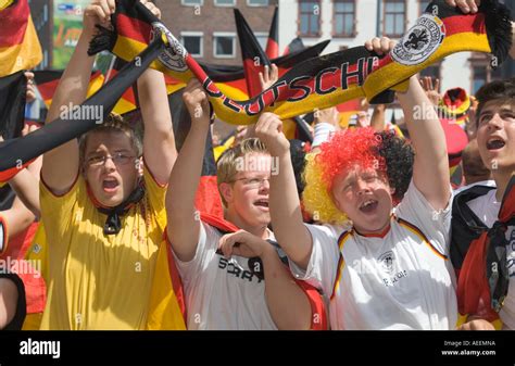 German Football Fans Cheering In Good Mood At A Football World Cup