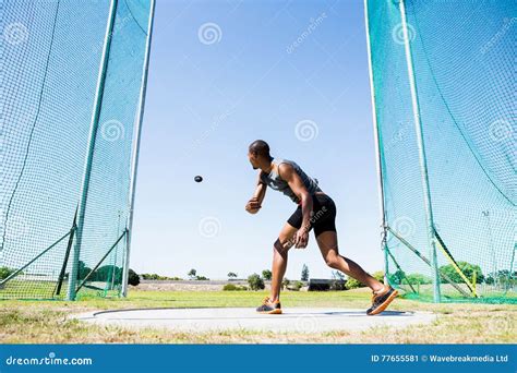 Athlete Throwing Discus In Stadium Stock Image Image Of Efforts