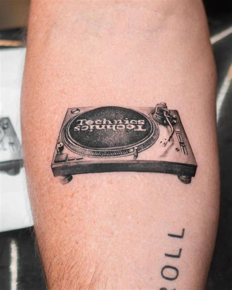 Micro Realistic Style Turntable Tattoo Done On The