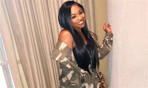 Reginae Carter Switches Hair From Black To Pink As She Takes On Critics Of Her Relationship With