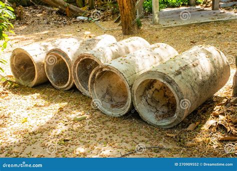 Cracked Old Sewer Pipe Located In Local River With Wastewater Coming