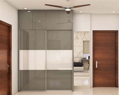 Door Sliding Wardrobe Design With Loft Storage Livspace