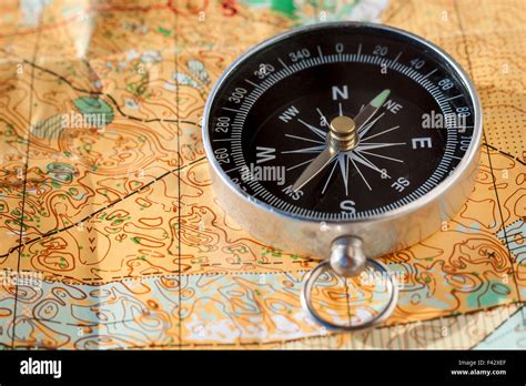 Compass On Orienteering Map Stock Photo Alamy