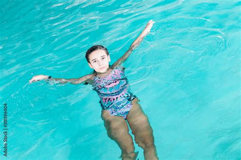 Girl Swim In The Pool Happy Girl Play In The Poolbeautiful Girl Swim And Having Fun In Water