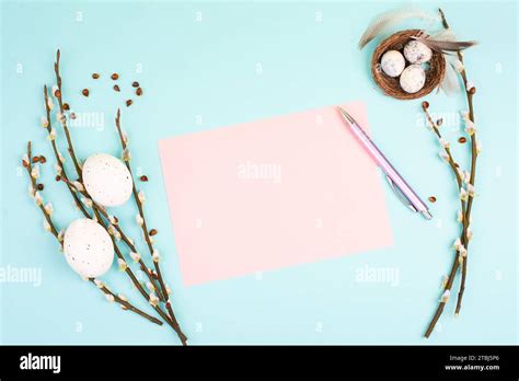 Easter Holiday Background Wicker Nest With Small Eggs Branches Of Pussy Willow Pastel Color