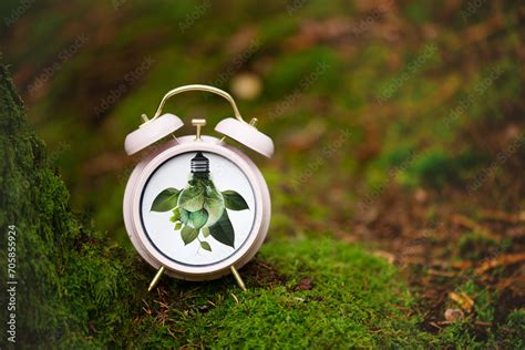 World Earth Hour Alarm Clock Stands In The Forest Turn Off Lights