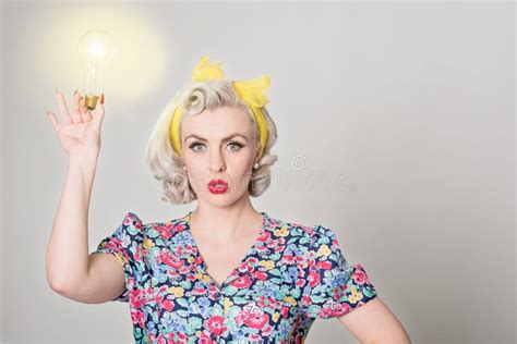 Cute Blonde Retro Girl Holding Glowing Light Bulb Humorous Con Stock Photos Free Royalty