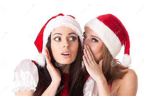 Twee Jonge Vrouwen In Het Kostuum Van De Kerstman Stock Foto Image Of