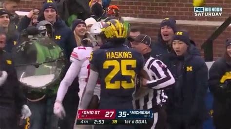 Ohio State Player Rips Off Michigan Players Helmet— Then Gets Hurdled