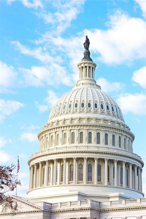 Statue Of Freedom On Top Of United States Capitol Building In