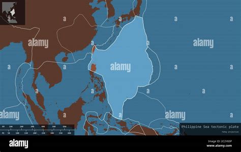 Philippine Sea plate shape outlined on a darkened and desaturated ...