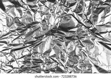 Crumpled Silver Aluminum Foil Background Abstract Stock Photo 723288736