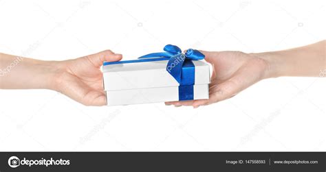 Hands Giving And Receiving Gift Box Stock Photo Belchonock