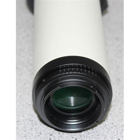 An Opteka 650 1300mm High Definition Telephoto Zoom Lens In Case