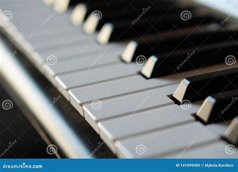 Electronic Synthesizer Piano Keyboard In The Sun`s Rays Macro Stock