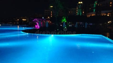 Hotel Swimming Pool at Night Stock Image - Image of night, building ...