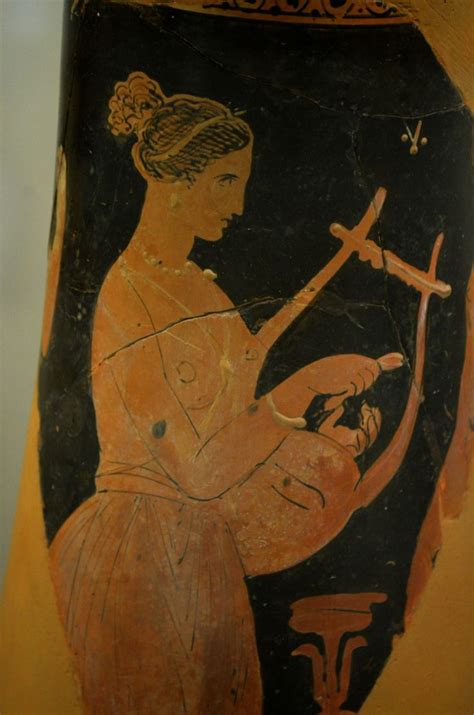 Fragment Of Ancient Greek Pottery Depicting A Woman Playing The Lyre