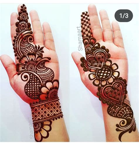 Two Hands With Henna Designs On Them One Showing The Intricate Design