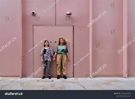 Happy Lesbian Couple Standing Front Pink Stock Photo Shutterstock