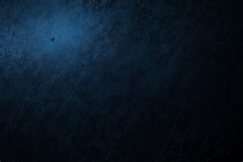 A Dark Blue Wallpaper With A Dark Blue Background And A White Light