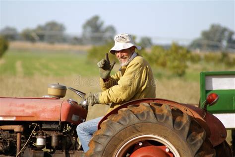 Farmer On Tractor Royalty Free Stock Photography - Image: 2624417