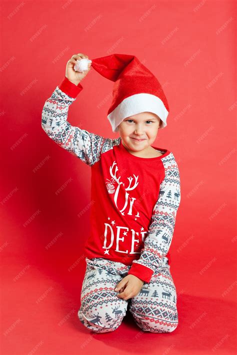 Premium Photo | Cute little girl wearing christmas pajamas