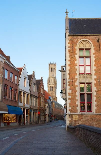 Premium Photo Street Of Old Bruges With Belfort Tower Belgium