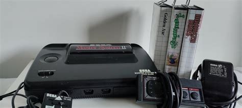 1 Sega Master System 2 - Console with games (3) - Catawiki