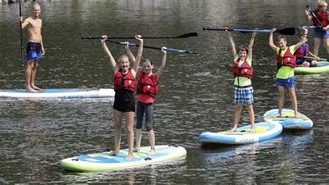 Kinder üben Stand Up Paddling bei Ferienpass Aktion in Osnabrück NOZ