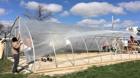 Covering The Greenhouse With Poly Youtube