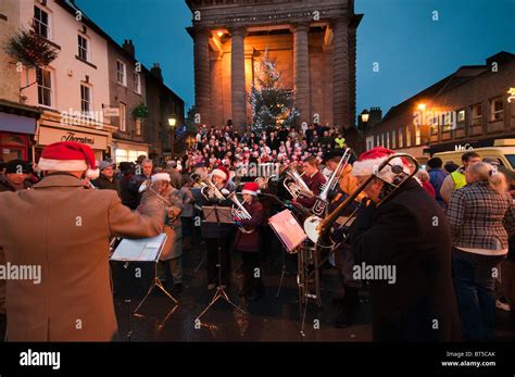 Christmas carol singing Stock Photo - Alamy