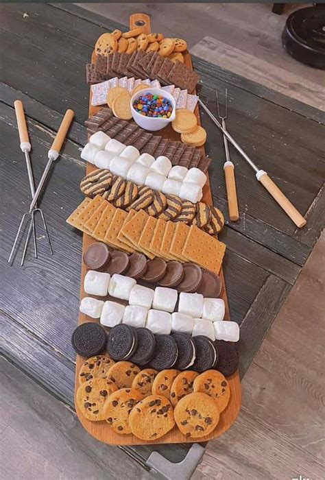 Smores Charcuterie Board With A Variety Of Cookies And Marshmallows