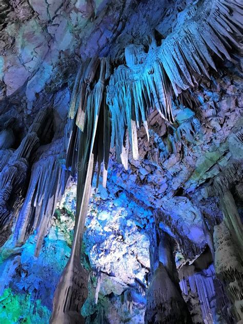 Illuminated Limestone Caves And Stalagmite Formations In St Michael S