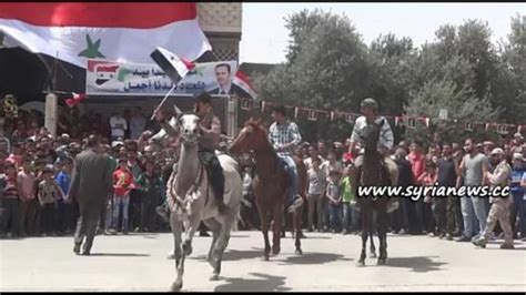 People Of Jayrud Celebrating The Liberation Of Their City From