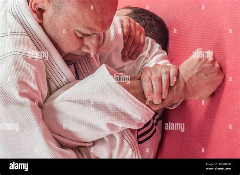 Brazilian Jiu Jitsu Training Demonstration In Traditional Kimono Bjj