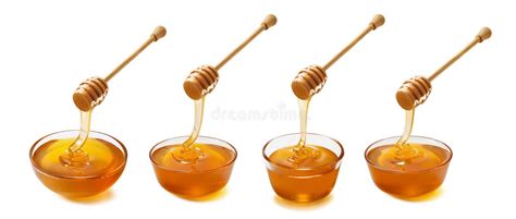 Set Of Wooden Dippers With Dripping Honey Isolated On White Back Stock