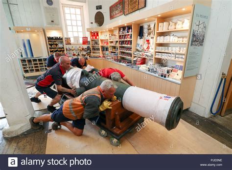 Workmen Move A Pound Cannon Into Position Which Is The First