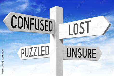 Lost concept (confused, lost, puzzled, unsure) - wooden signpost Stock Photo | Adobe Stock