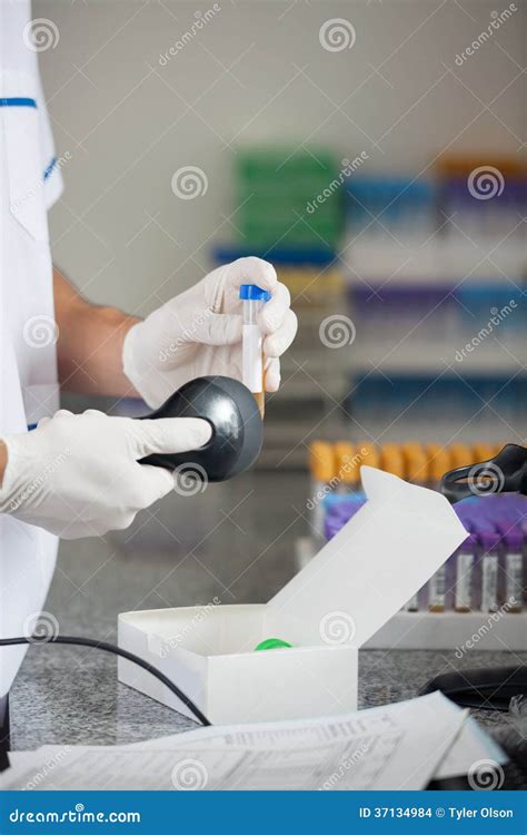 Technician Scanning Barcode On Medical Sample Stock Photo Image Of