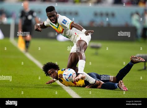 Ecuador S Angelo Preciado Left And Senegal S Ismaila Sarr Vie For The