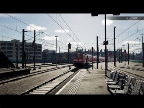 111 031 zieht den RE5 nach München Hbf hier bei der Ausfahrt in