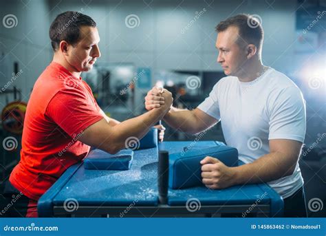 Arm Wrestlers Prepares for Battle at the Table Stock Photo - Image of fight, powerful: 145863462