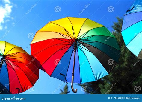 Hanging Rainbow Umbrellas On Blue Sky Background Stock Photo Image Of