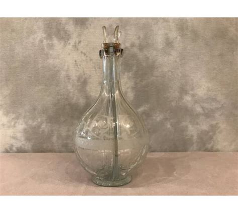 Bouteille carafe à liqueurs en cristal gravé à 4 compartiments d époque