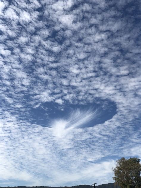 Amazing Hole Punch Phenomenon Spotted In Clouds Over Bay Area