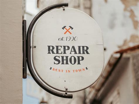 Front View of a Vintage Round Shop Sign Mockup Free Download | Resource Boy