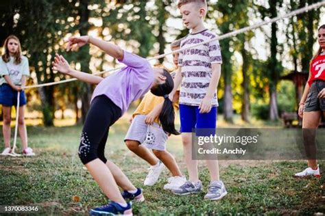 Kids Playing Limbo Photos And Premium High Res Pictures Getty Images