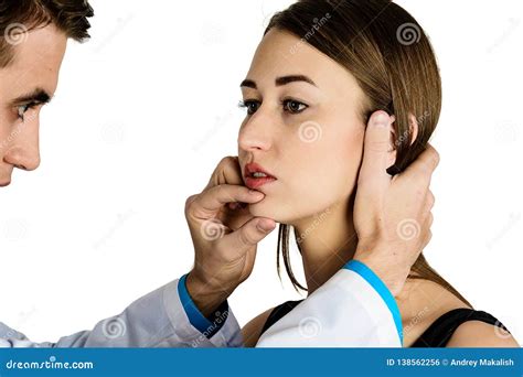 Plastic Surgery Doctor Patient Inspection And Consultation Stock Photo